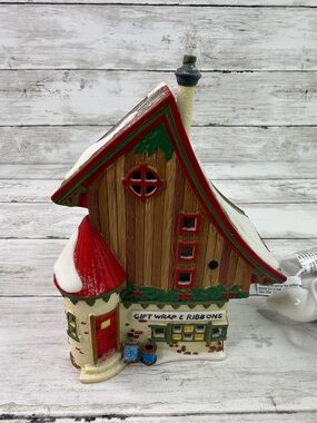 Dept. 56 North Pole Village Gift Wrap & Ribbons  no box or flag includes light